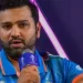 Rohit Sharma cuts off a reporter when they inquire about the contentious boundary count decision, saying, "It's not my job."