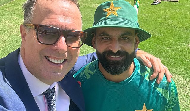 After a disagreement online, Michael Vaughan shares a selfie with Muhammad Hafeez. 1 After a disagreement online, Michael Vaughan shares a selfie with Muhammad Hafeez.