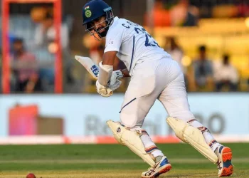 Cheteshwar Pujara scores a century in the 'First Class' match against Jharkhand in the Ranji Trophy 2023-24.