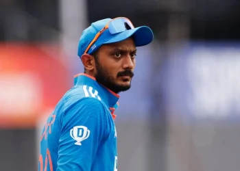 "Axar Patel jokes about the cold weather in Mohali during the first Twenty20 International," asking the umpire whether he may wear a glove.