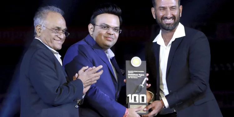 At Rajkot's Niranjan Shah Stadium, Cheteshwar Pujara was feted. 1 At Rajkot's Niranjan Shah Stadium, Cheteshwar Pujara was feted.