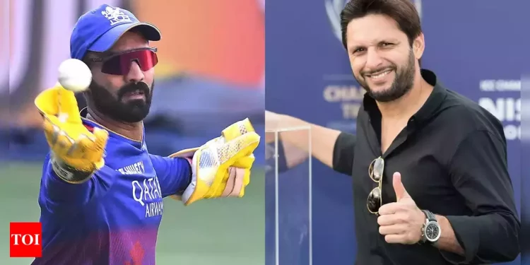 Dinesh Karthik makes a sneaky jab at Shahid Afridi in the midst of retirement rumors, saying, "Unless you are Shahid Afridi." 1 Dinesh Karthik makes a sneaky jab at Shahid Afridi in the midst of retirement rumors, saying, "Unless you are Shahid Afridi."